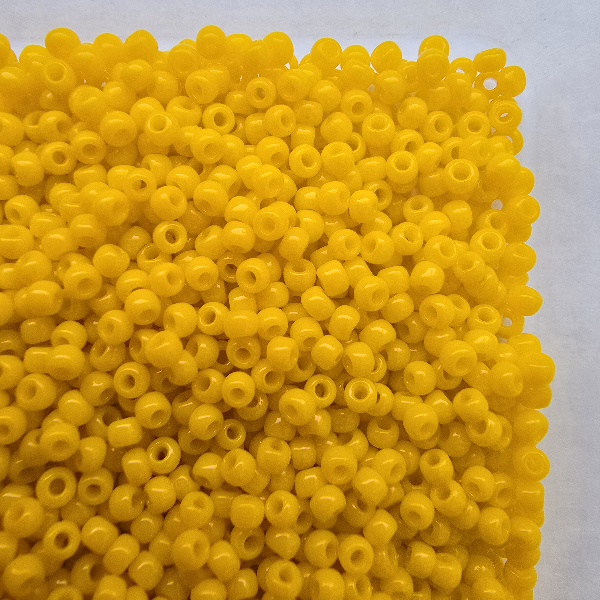 TOHO kása 11/0 42B Opaque Sunshine